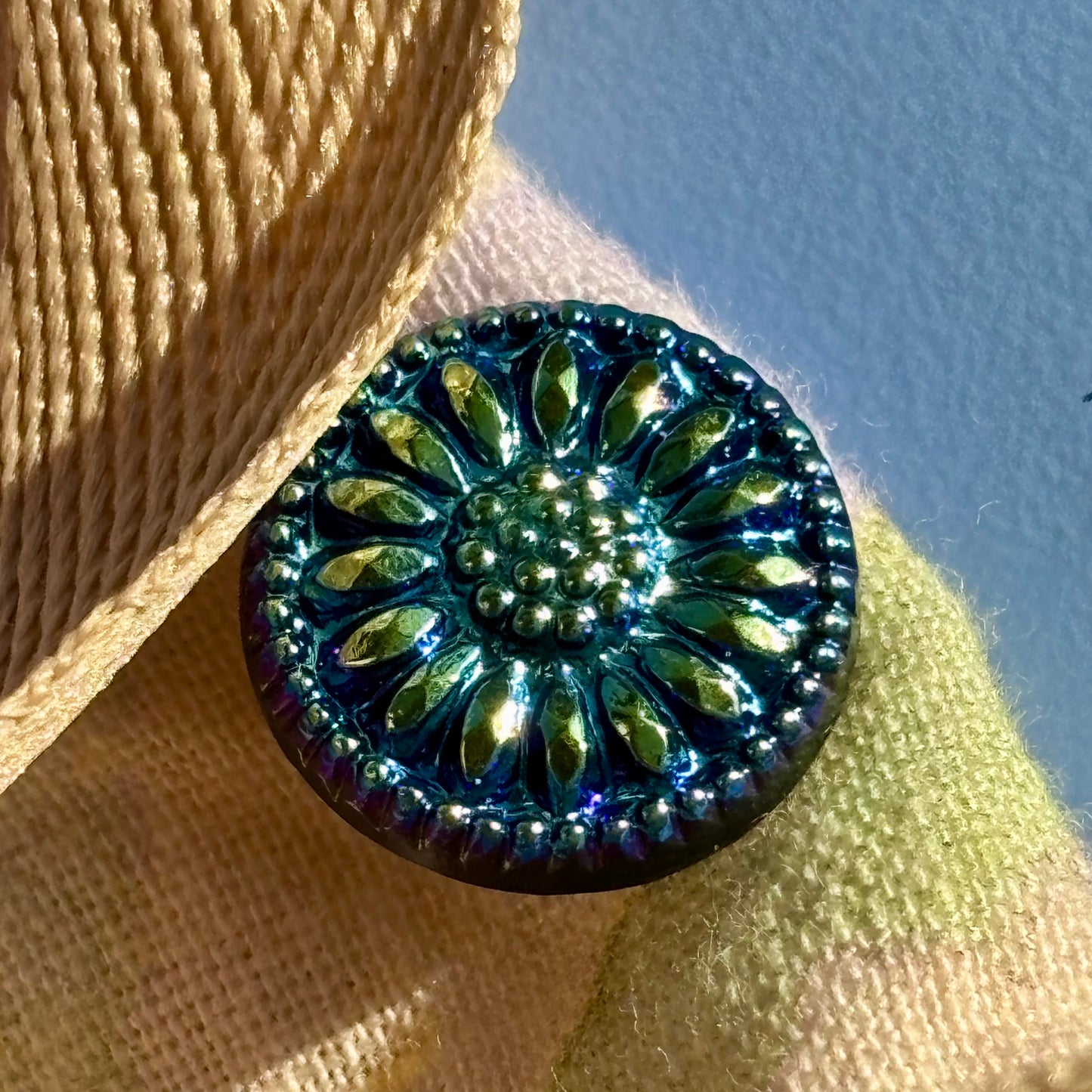 solsikke glasknap lille 14mm sort perlemor